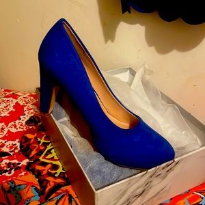 Blue suede pumps
